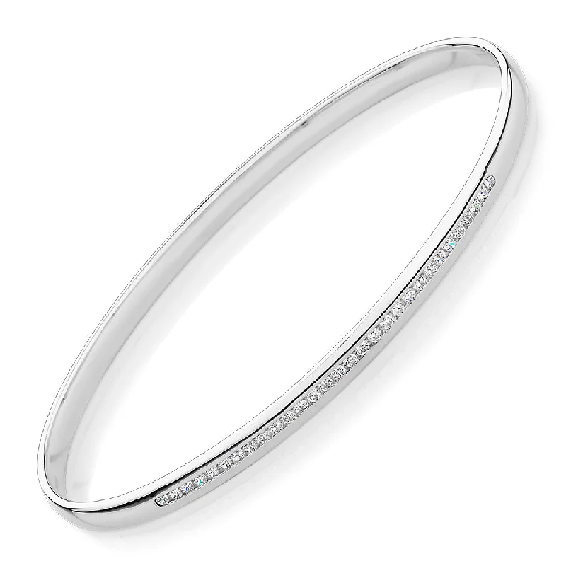 Luxury Wedding Bangles-Oval bangle with 0.45 carats* of diamond simulants in 10 carat white gold