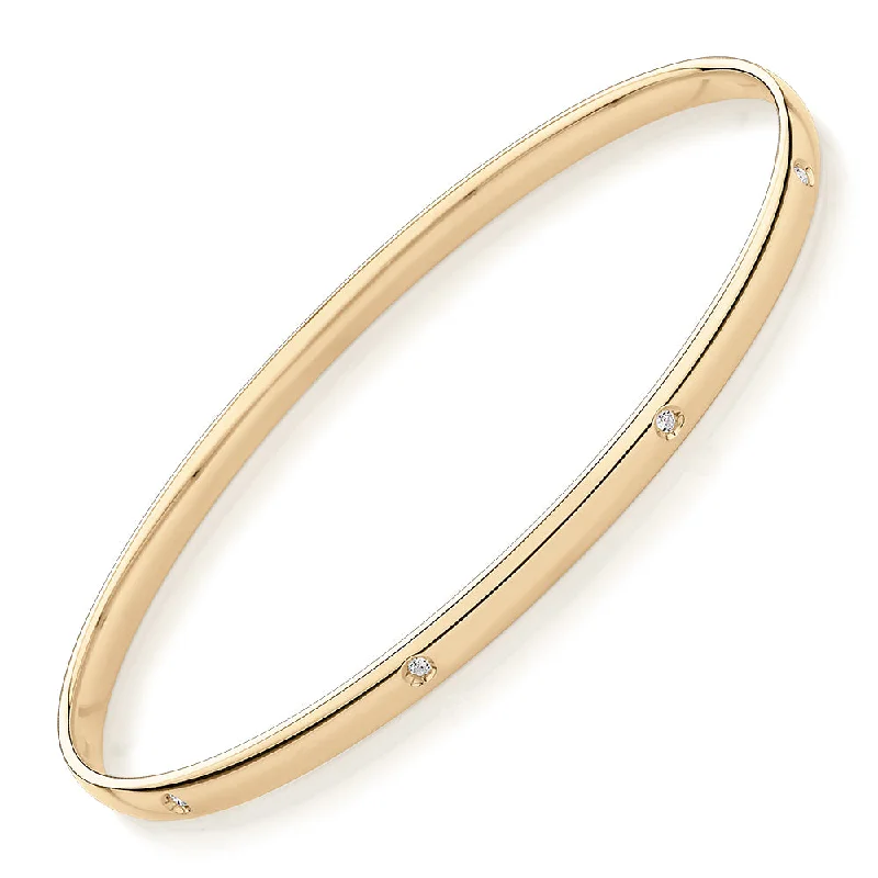 Crystal Bangle Bracelets-Oval bangle with diamond simulants in 10 carat yellow gold