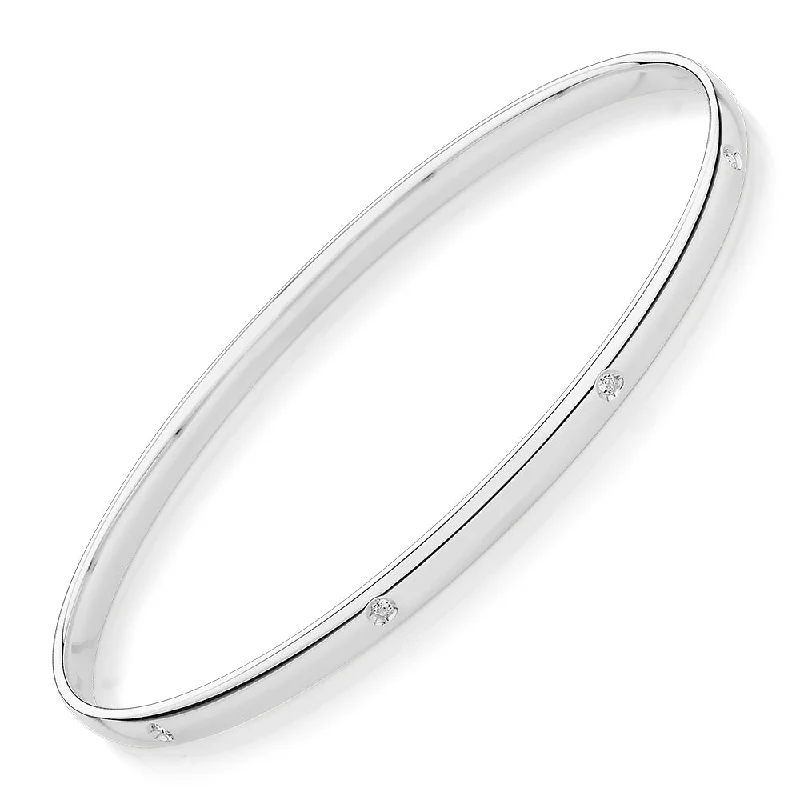 Beautiful Gold Bangles-Oval bangle with diamond simulants in 10 carat white gold